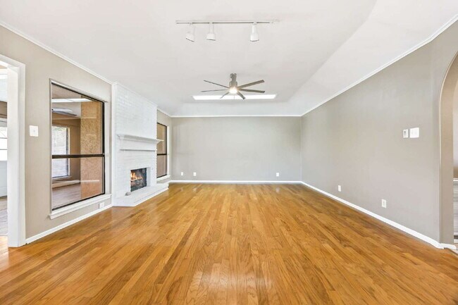 Photo - "Charming garden home offers 3-Bedroom Sanctuary with Cozy Fireplace in San Antonio – 1710 Sq Ft ...