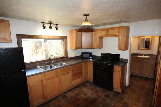 Photo - Charming Single-Story Home Near NAU | Fenced Yard + Fireplace