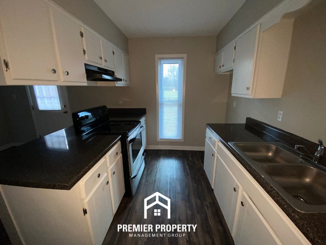 Photo - 3 Bedroom Home for Rent in Memphis, TN | Brick Fireplace & Fenced Backyard