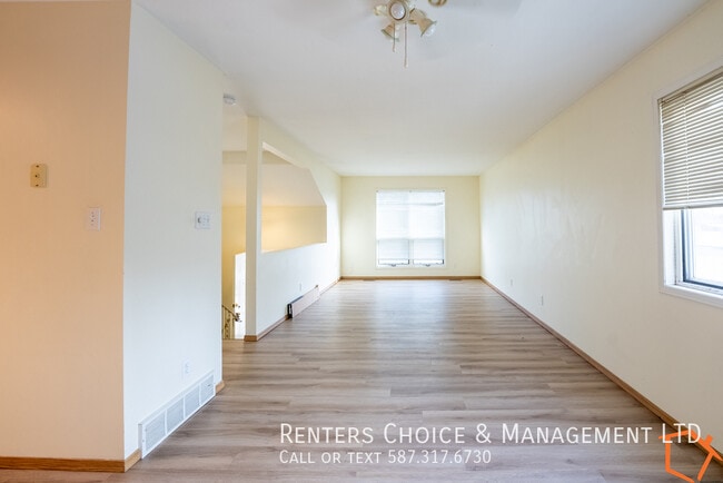 Photo - Easy Walk to Downtown Amenities, Assigned Parking, Spacious Townhouse