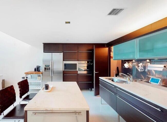Photo - 6000 Collins Ave Condo Unit 124