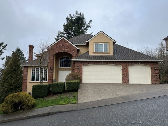 Building Photo - Executive-Style Northwest Heights Home with Forest Views and Refined Architectural Details