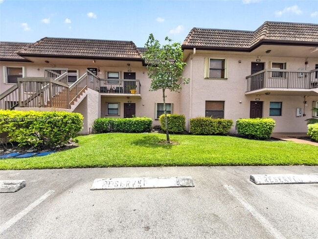 Building Photo - 10616 NW 10th St Unit 104