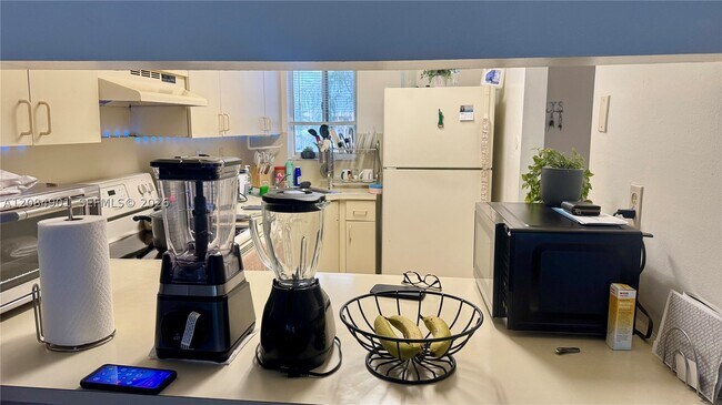Photo - 2710 W 76th St Unit 208