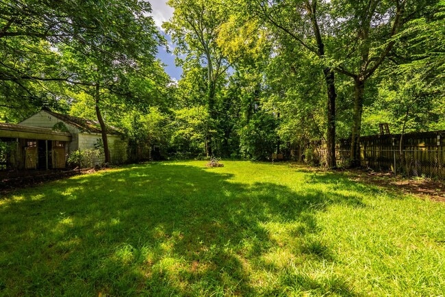 Photo - Charming 2BR/1BA Brick Cottage — Hardwoods, Fenced Yard, W/D Included