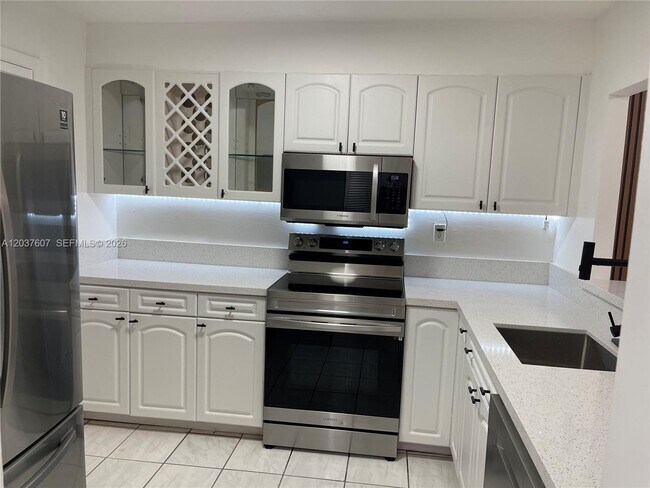 Photo - 8233 Harding Ave Unit 408
