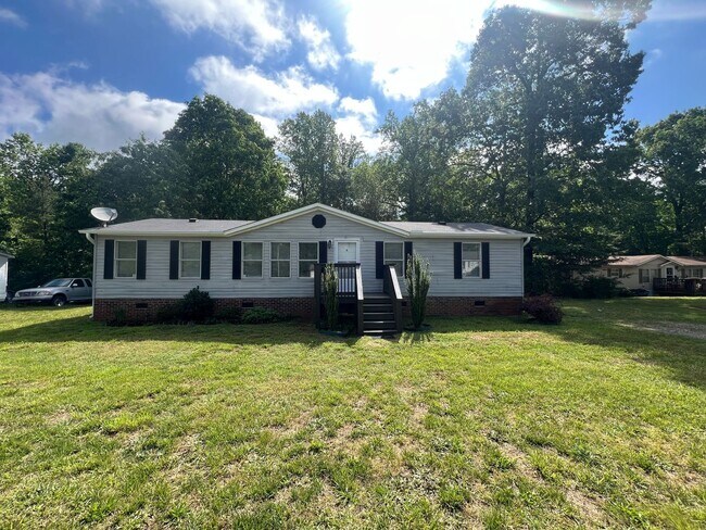 Photo - Introducing a charming 4-bedroom, 2-bathroom house in the desirable Gastonia, NC area
