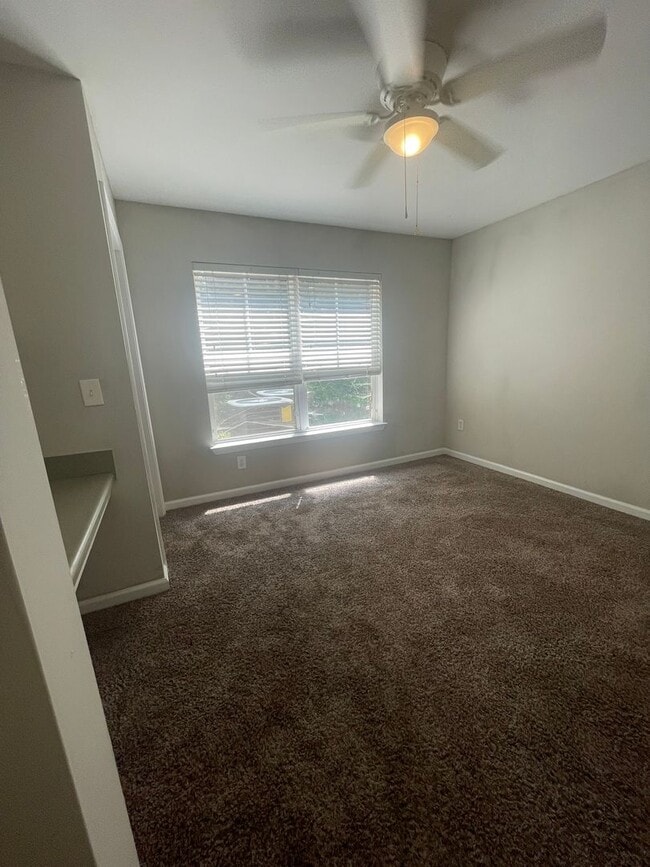 Building Photo - 3930 Cherokee Woods Way Unit 10-203 - D