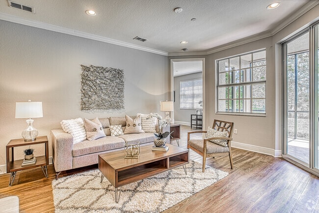 Broadmoor - spacious Living Area with direct access to screened in veranda