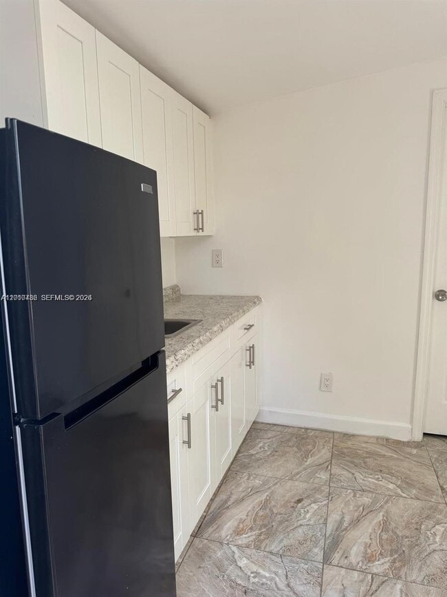 Building Photo - 16920 NW 40th Ave Unit D