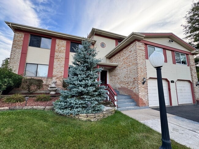 Building Photo - 5153 W 82nd Ct Unit C