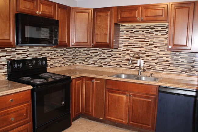 Photo - Spacious 4-bedroom, 1.5-bath home located ...