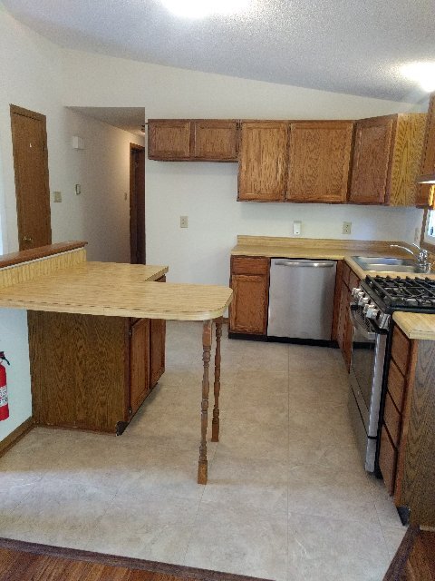 Cocina con isla en forma de L - 314 Lake Crystalbrook Dr