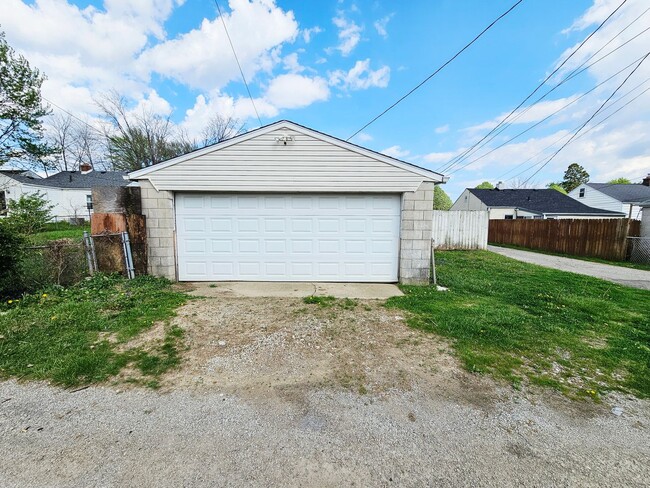 Photo - Move-In Ready 2BR/1BA Home w/ 2-Car Garage | Recently Updated