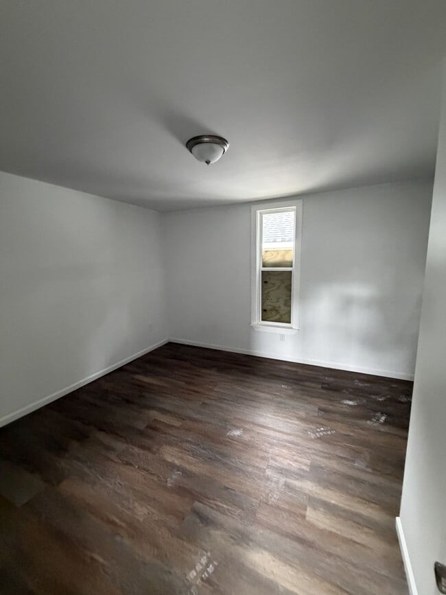 Photo - Spacious 4-Bedroom, 2-Bath House – Unfurnished
