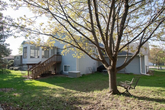 Photo - 3-Bedroom NE Rochester home with Sunroom, Fenced Backyard & Attached Garage
