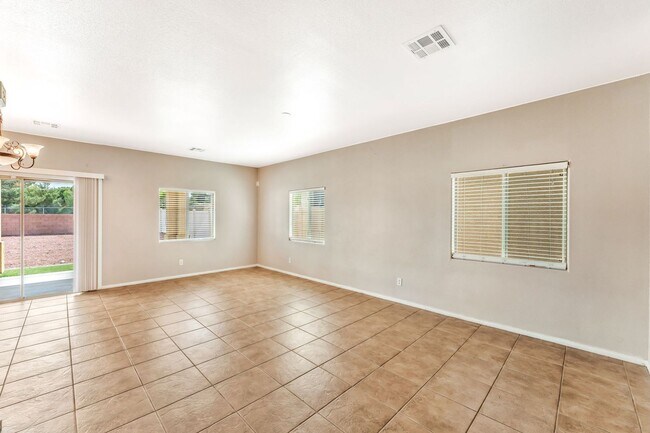 Photo - Stylish Two-Story Home with Loft and Dual Balconies in a Bright, Open Layout!