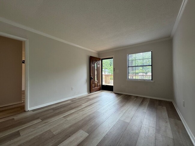 Photo - Large 3/2 with finished basement/bonus room- $1,895