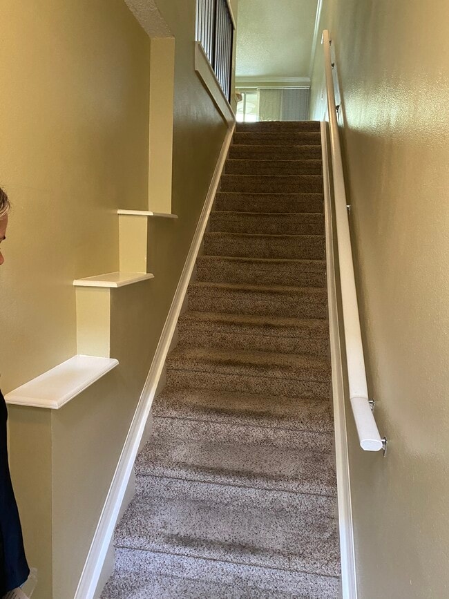 Stairs to main level - 4763 Travini Cir Unit 105