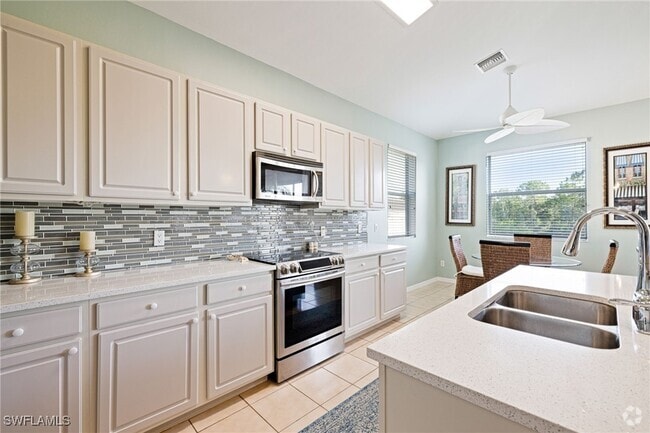 Building Photo - 9120 Spanish Moss Way Unit 521 Rental