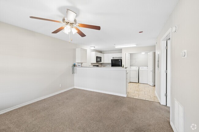 1BR, 1BA - 740SF -Living Room and Kitchen