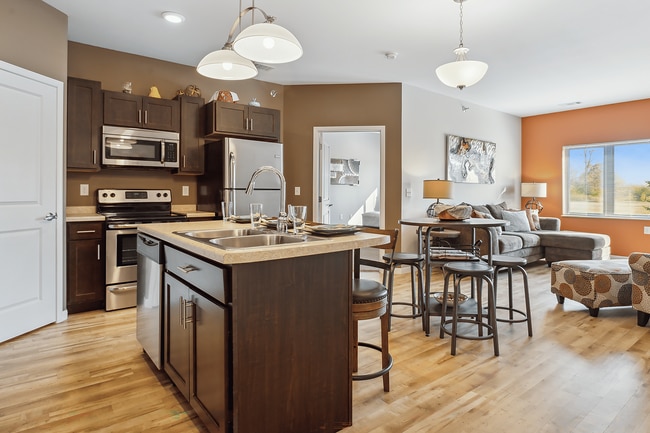 Kitchen Island with Breakfast Bar - Deer Ridge Apartments