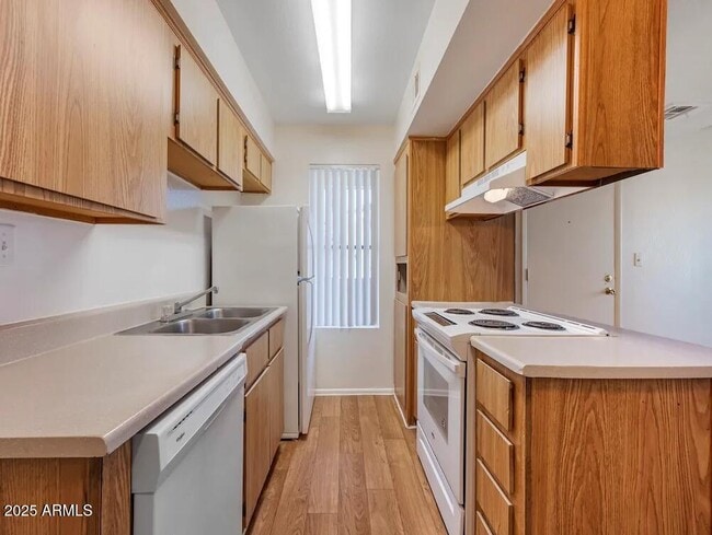 Photo - 5750 N 59th Ave Unidad 2