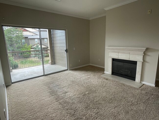 Living room with gas fireplace - 7483 S Quail Cir Unit 624