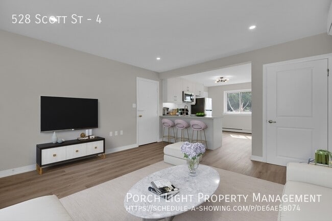 Photo - Private Laundry. Private AC. Balcony. Available Parking. Modern Renovations. Excellent location. Unit 4