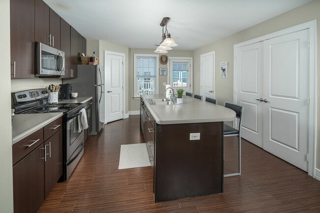 Model Kitchen - The Avenue at Orono Apartments