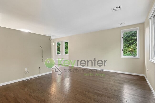 Photo - Spacious 2BR/2BA Duplex in Gated Community with Parking, Washer/Dryer & NYC Skyline Views