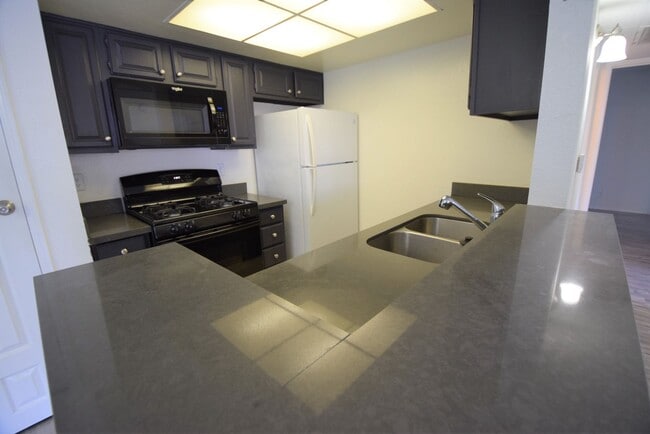 Photo - Atrium Apartments