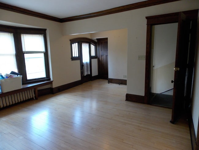 Living Room towards patio - 3408 N Downer Ave Unit 2nd Floor
