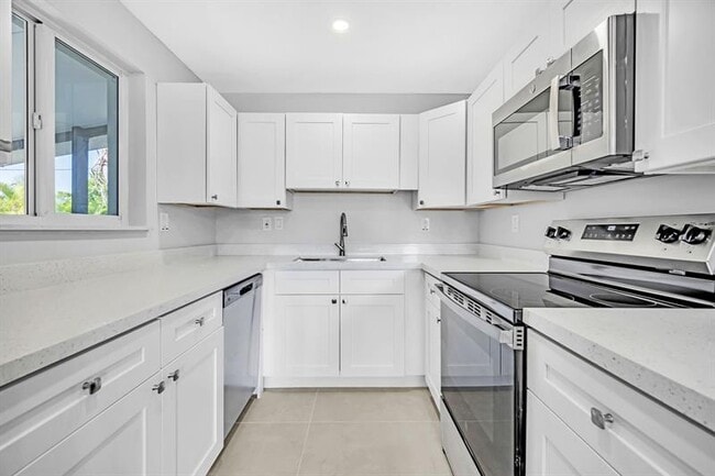 Building Photo - 5680 NE 7th Terrace Rental