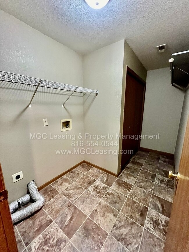 Photo - Grain Valley Rancher: Now Available — Immediate Move-In | Self-Guided Tours Open