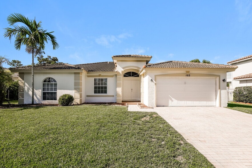103 Cocoplum Cir