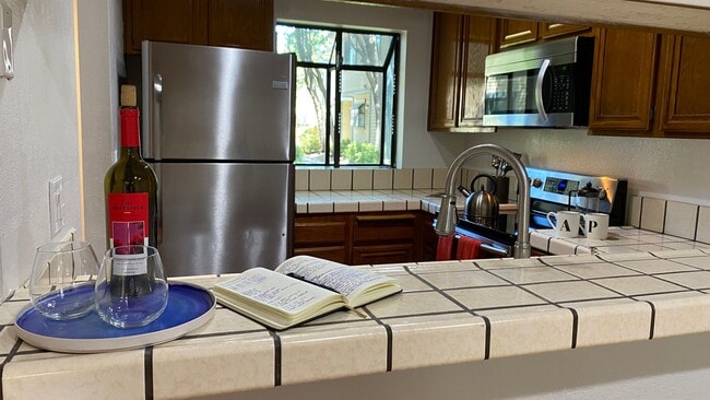 Building Photo - Advent - Tranquil Two Bedroom Condo W/ Patio & Two Assigned Parking Spaces!