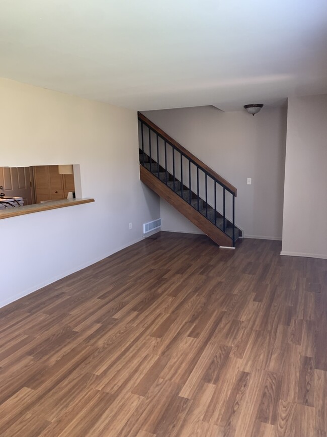 Living room - 4111 Charter Oak Dr Apartments