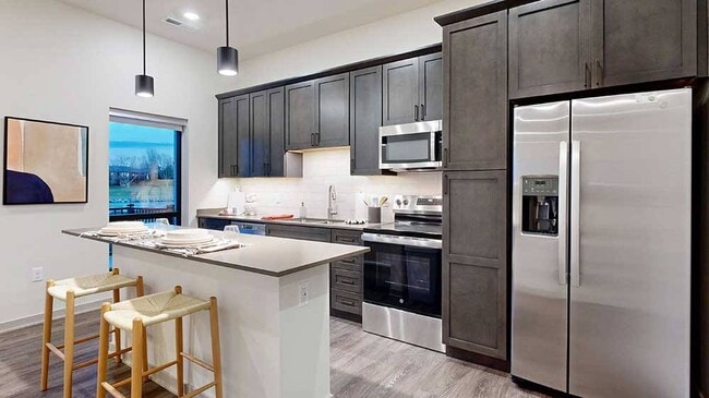Enjoy a full kitchen setup ready for cooking or reheating.