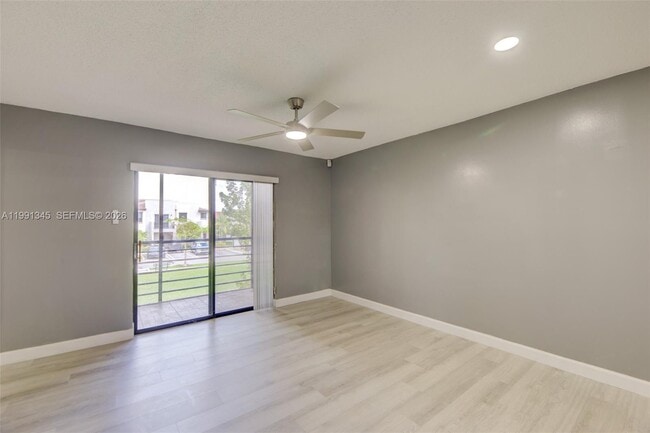 Photo - 851 NE 209th Terrace Unit 203-23