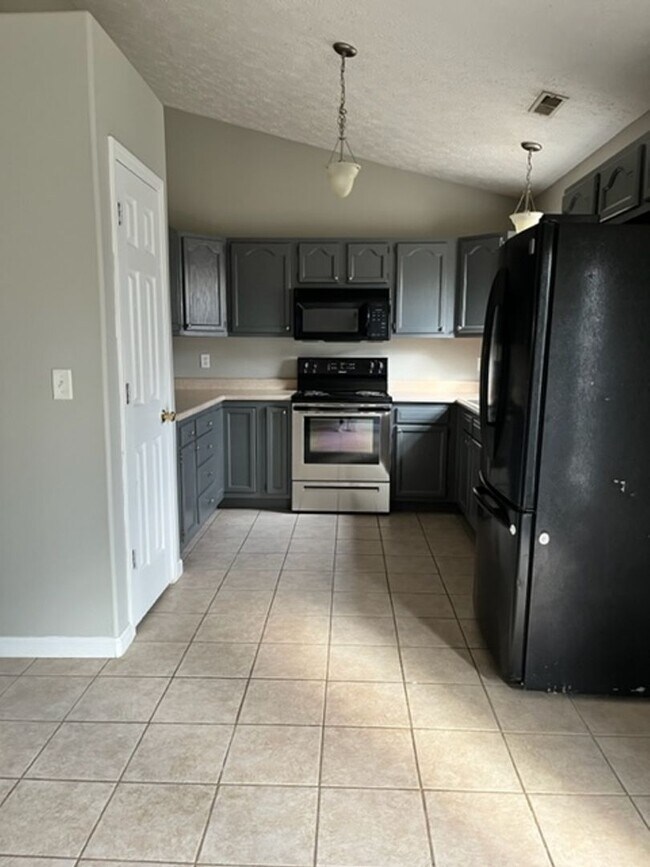 Photo - Gorgeous south side single family home in Romney Run subdivision. Fenced in back yard