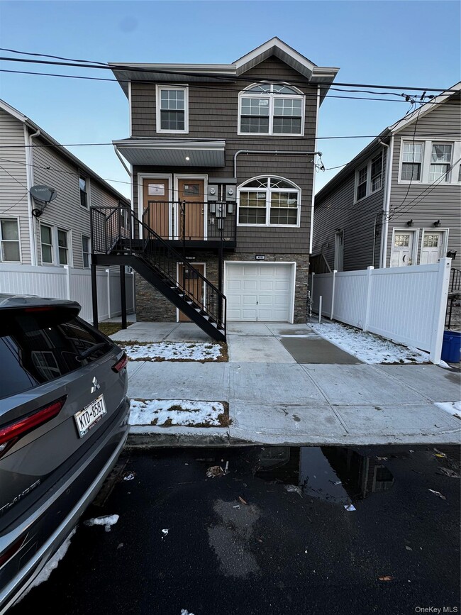 Building Photo - 4-18 Beach 38th St Unit 1