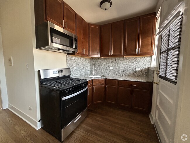 Building Photo - 2661 N Spaulding Ave Unit 224 Rental