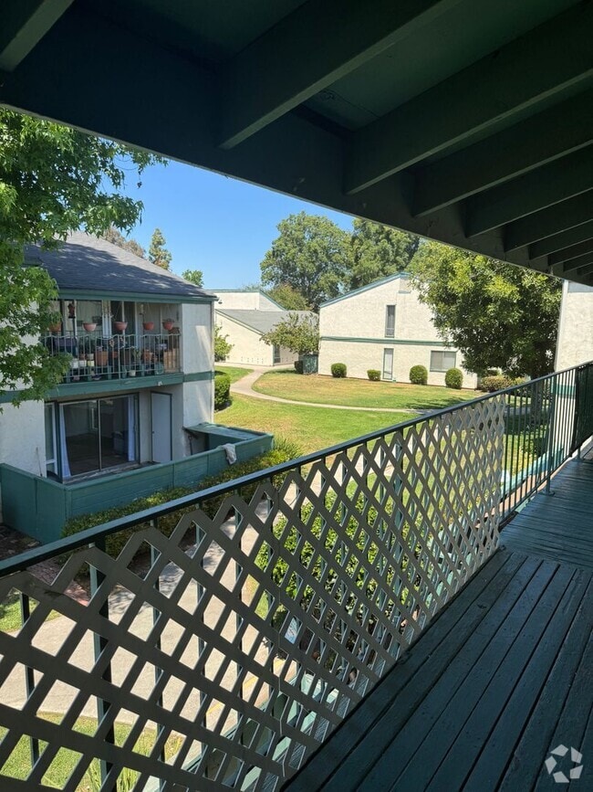 Building Photo - Upstairs two-bedroom 1/12 bath condo avail...