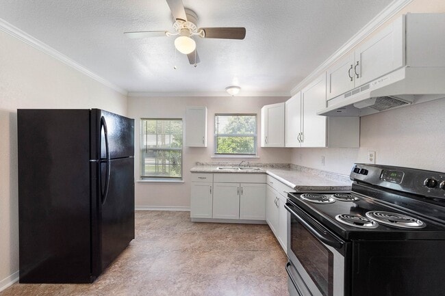 Photo - Lovely Brick 3 Bed/1 Bath Home w/ Large Covered Deck Back Porch w/ Fully-Fenced Yard