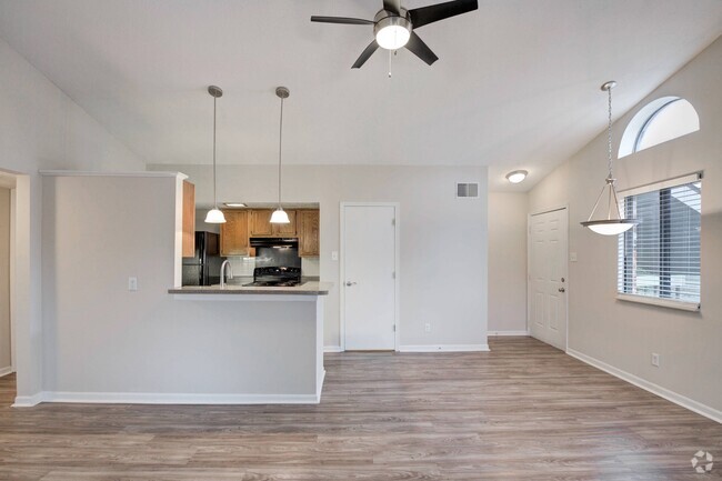 Living Room with Hardwood-Style Flooring - Avery Point Apartments