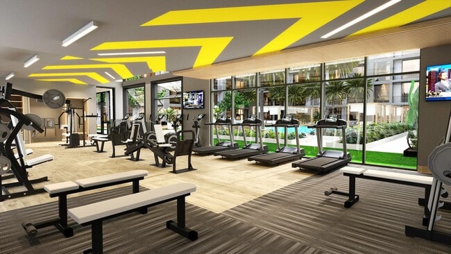 Club-quality fitness studio with spin bikes, sauna, and activity lawn. - Modera Kierland