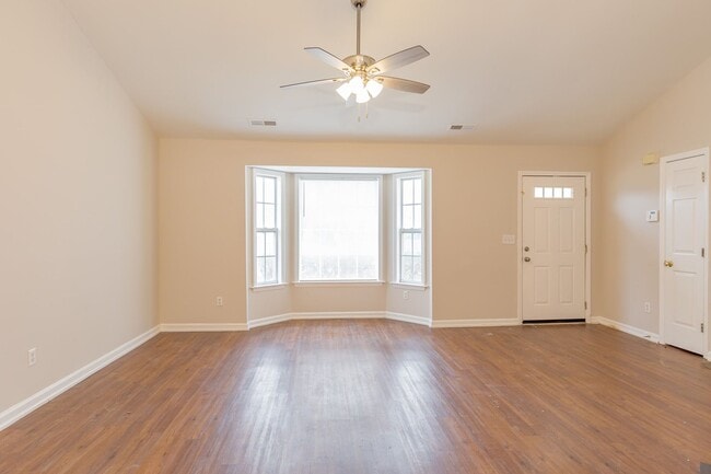 Photo - Beautiful 4 bed 2 bath home in Greensboro with fenced yard. Walk to coffee shop and restaurants.