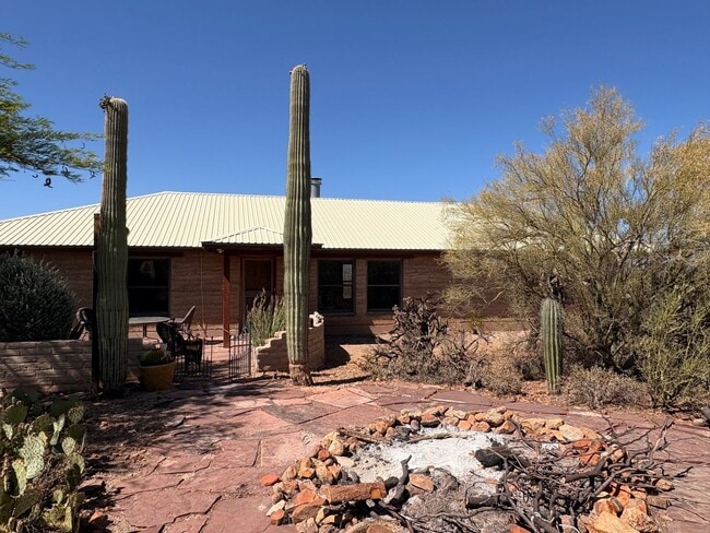 Building Photo - Desert Home on 3.3 Acres with Rooftop Views & Unique Rammed Earth Design