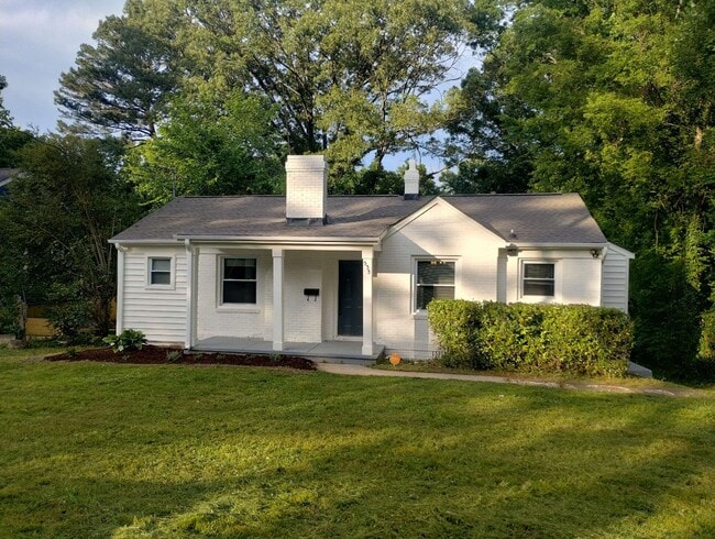 Building Photo - Charming Home, open  floor plan close to C...